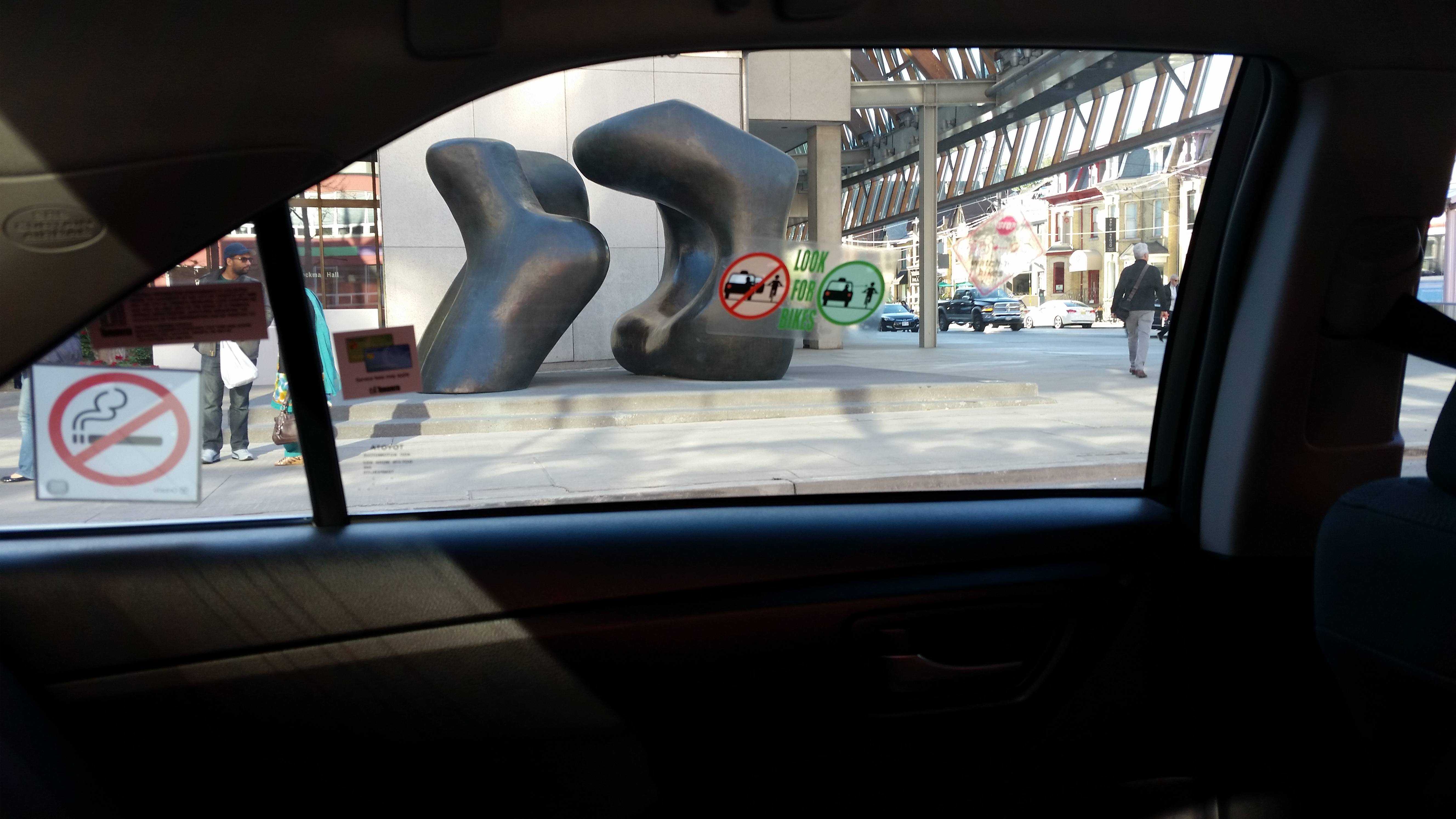 A view of the boulder statues from inside the cab on my way to RMH